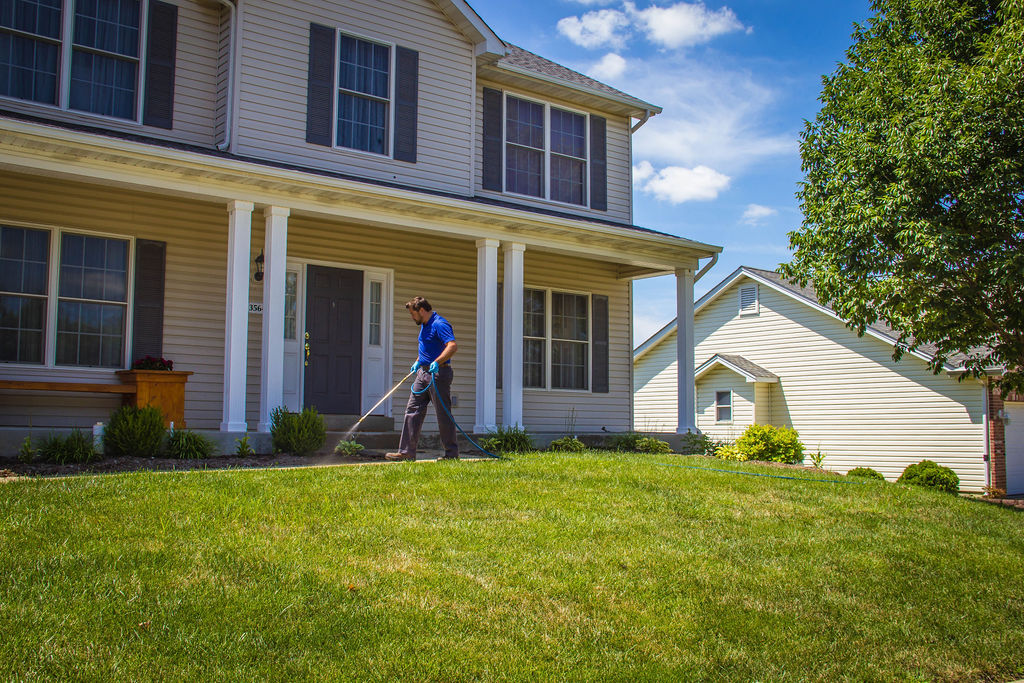 Treating the perimeter of a home from pests