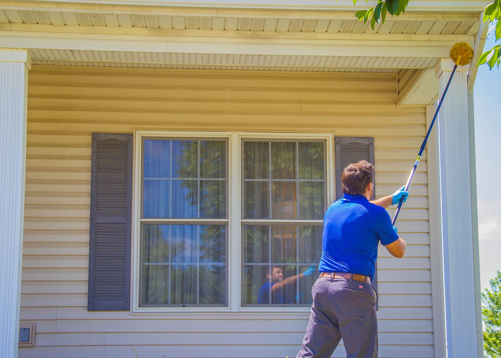 Treating a home during a quarterly pest control treatment